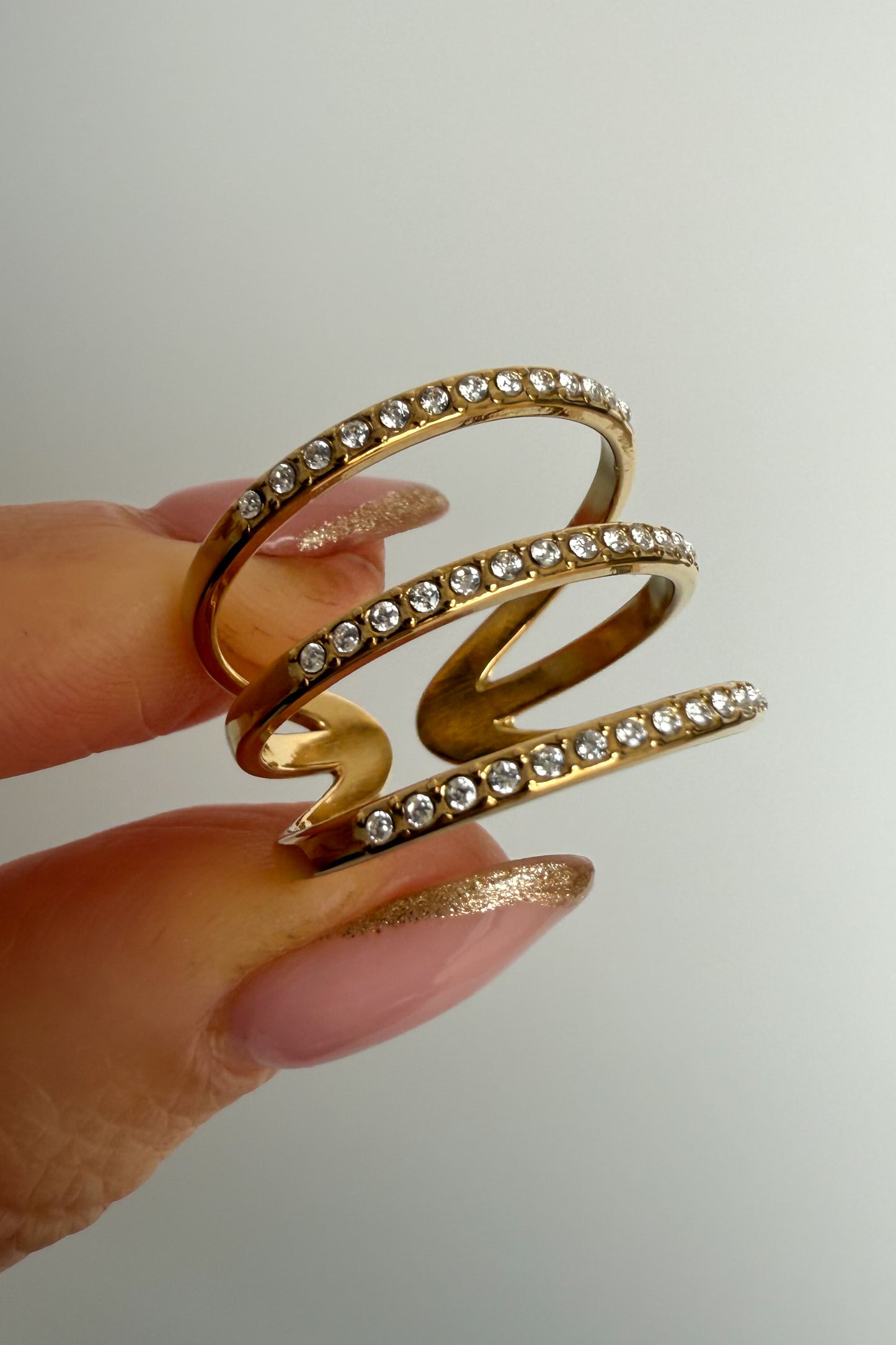 Anel ajustável em aço dourado